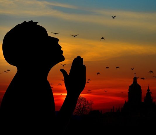 Praying to God to end discrimination based on color and the use of the derogatory N-word